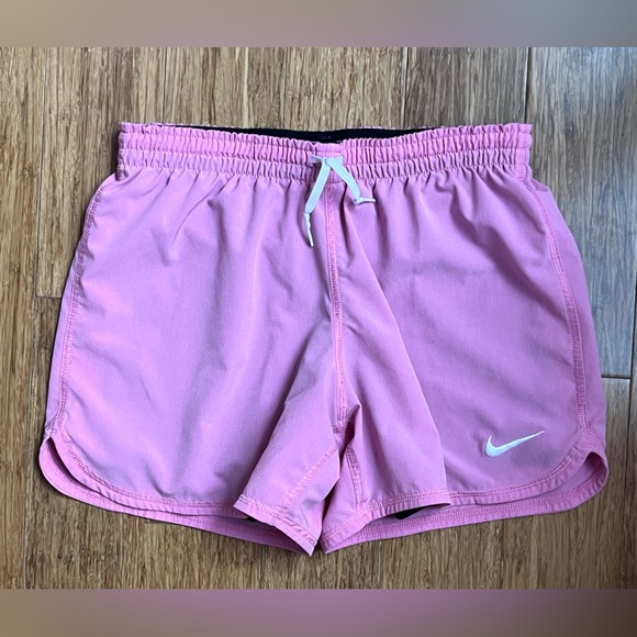 Nike Pants - Women’s Nike running shorts with spandex pink size XS
